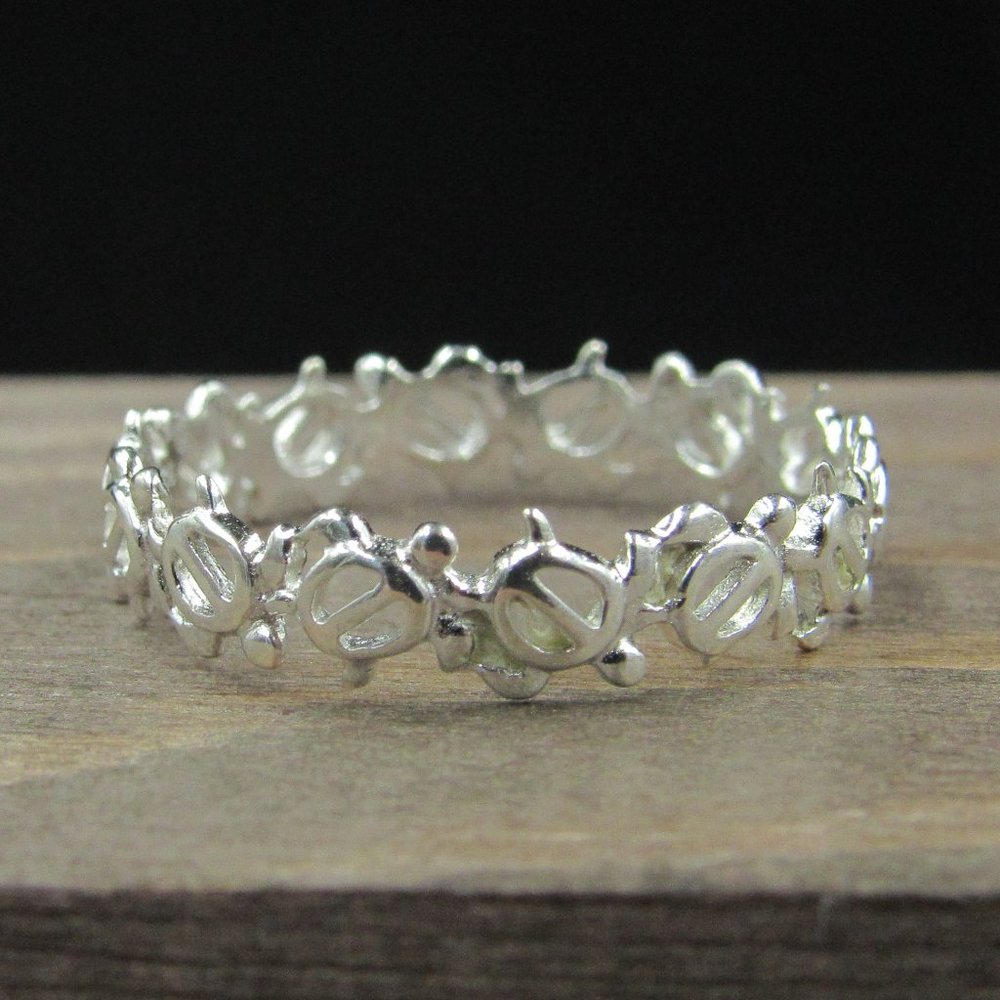 Size 9.75 Sterling Silver Tiny Turtles Band Ring - Picture 1 of 7
